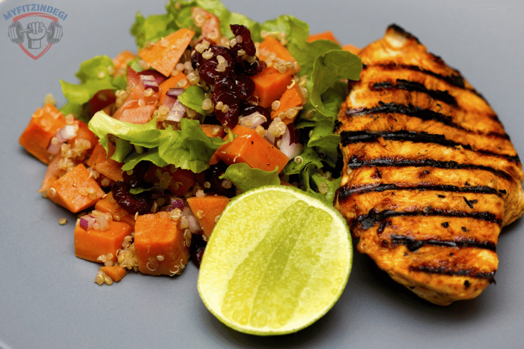 Balanced meal showing nutrition for fitness goals with protein, carbs, and vegetablesBalanced meal showing nutrition for fitness goals with protein, carbs, and vegetables