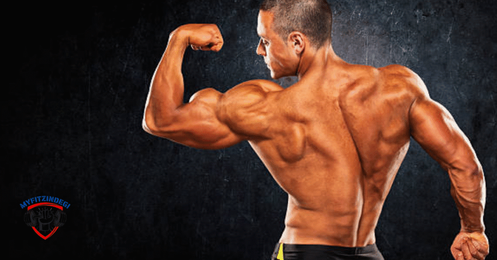 Man performing dumbbell overhead press during shoulder workout
