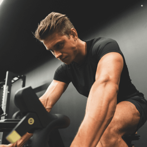 men cycling in the gym men cycling in the gym